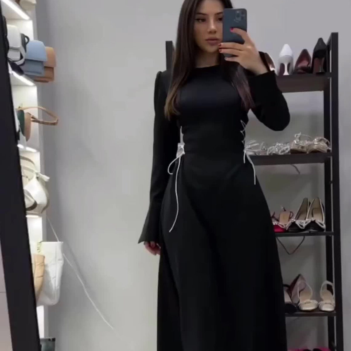 A Strappy Long-sleeved Cinched Waist Dress