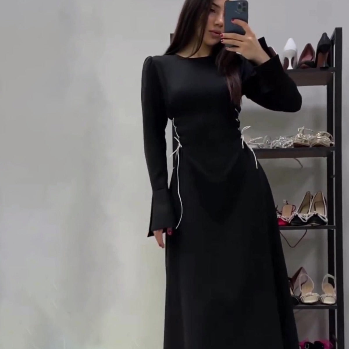 A Strappy Long-sleeved Cinched Waist Dress