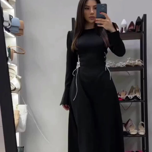 A Strappy Long-sleeved Cinched Waist Dress